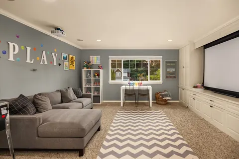 Bonus room sectional facing the projection screen