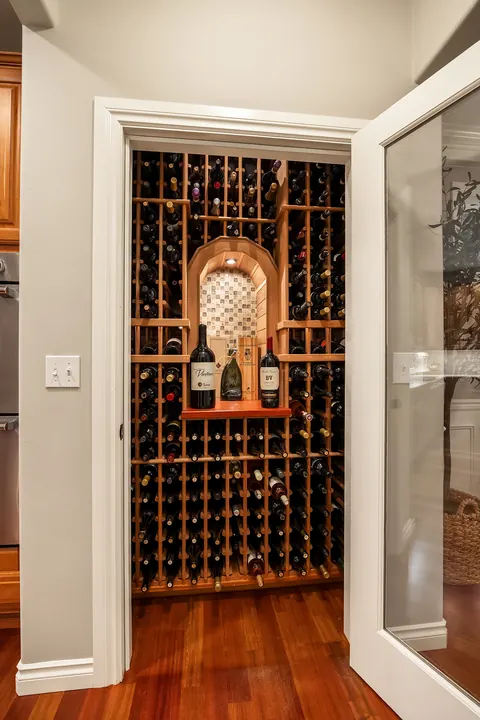 Temperature-controlled wine cellar with full-height racking